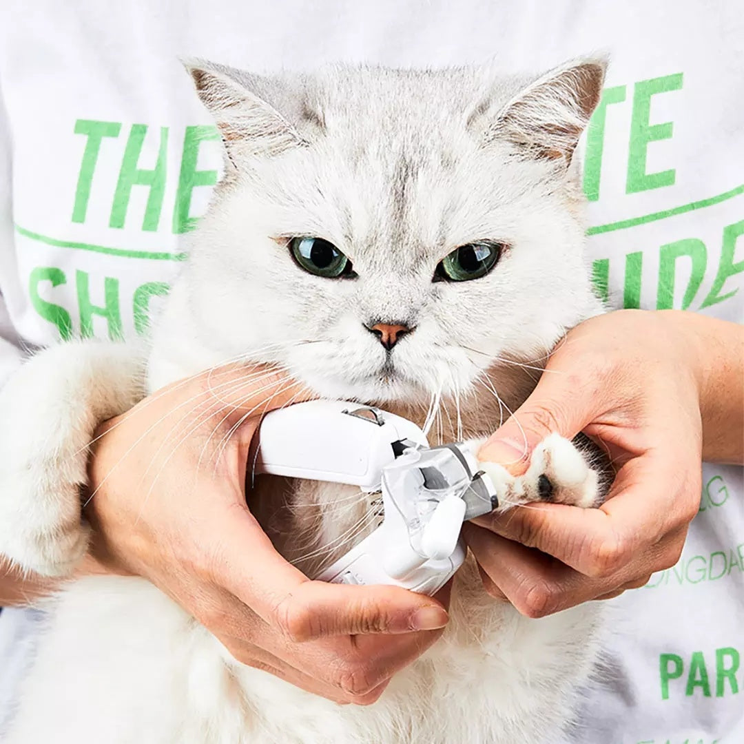 Safe & Compact Pet Nail Clipper: Hiddable file, prevents scratches, easy storage.