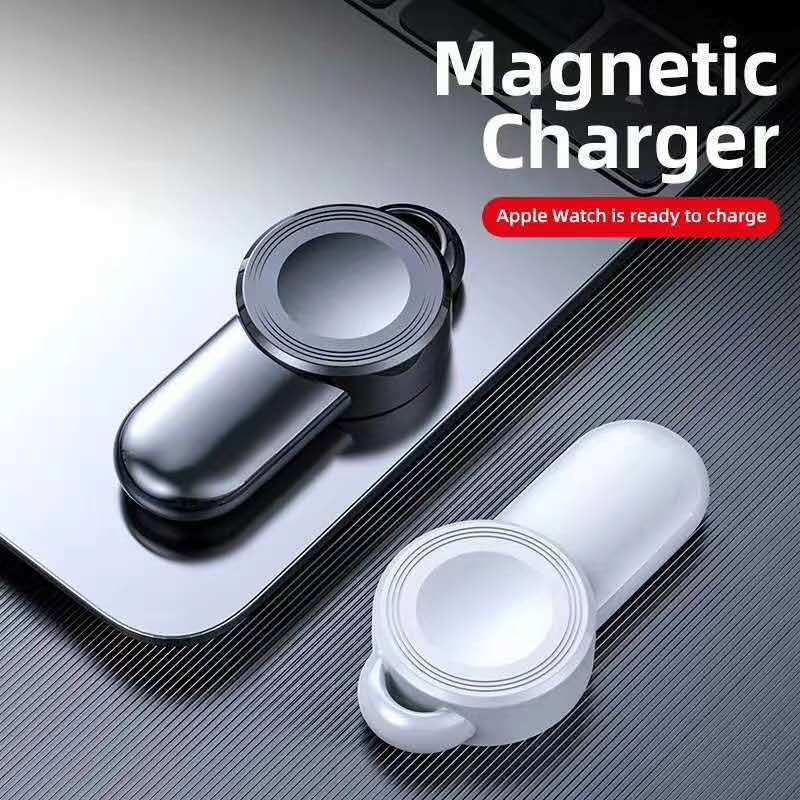 A sleek USB wireless charger with a minimalist design, placed on a wooden desk.