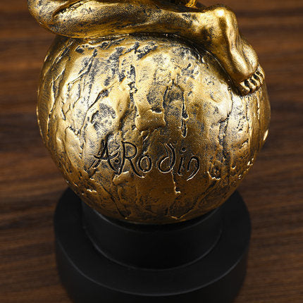 Add sophistication with this gold synthetic resin ornament, a beautiful decor piece.