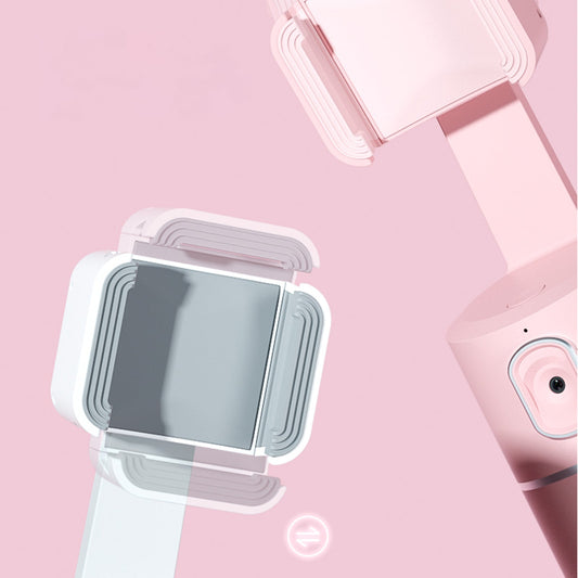 AI face tracking demonstration on a phone holder, showing smooth 360-degree rotation.